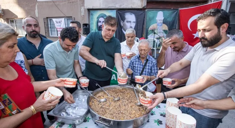 BAŞKAN TUGAY AŞURE DAĞITTI